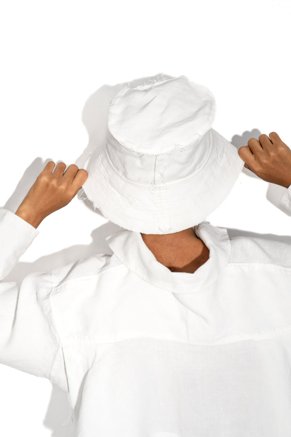 Layered white bucket hat