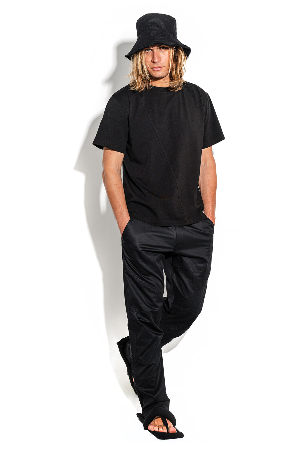 Black T-shirt with a geometric seam