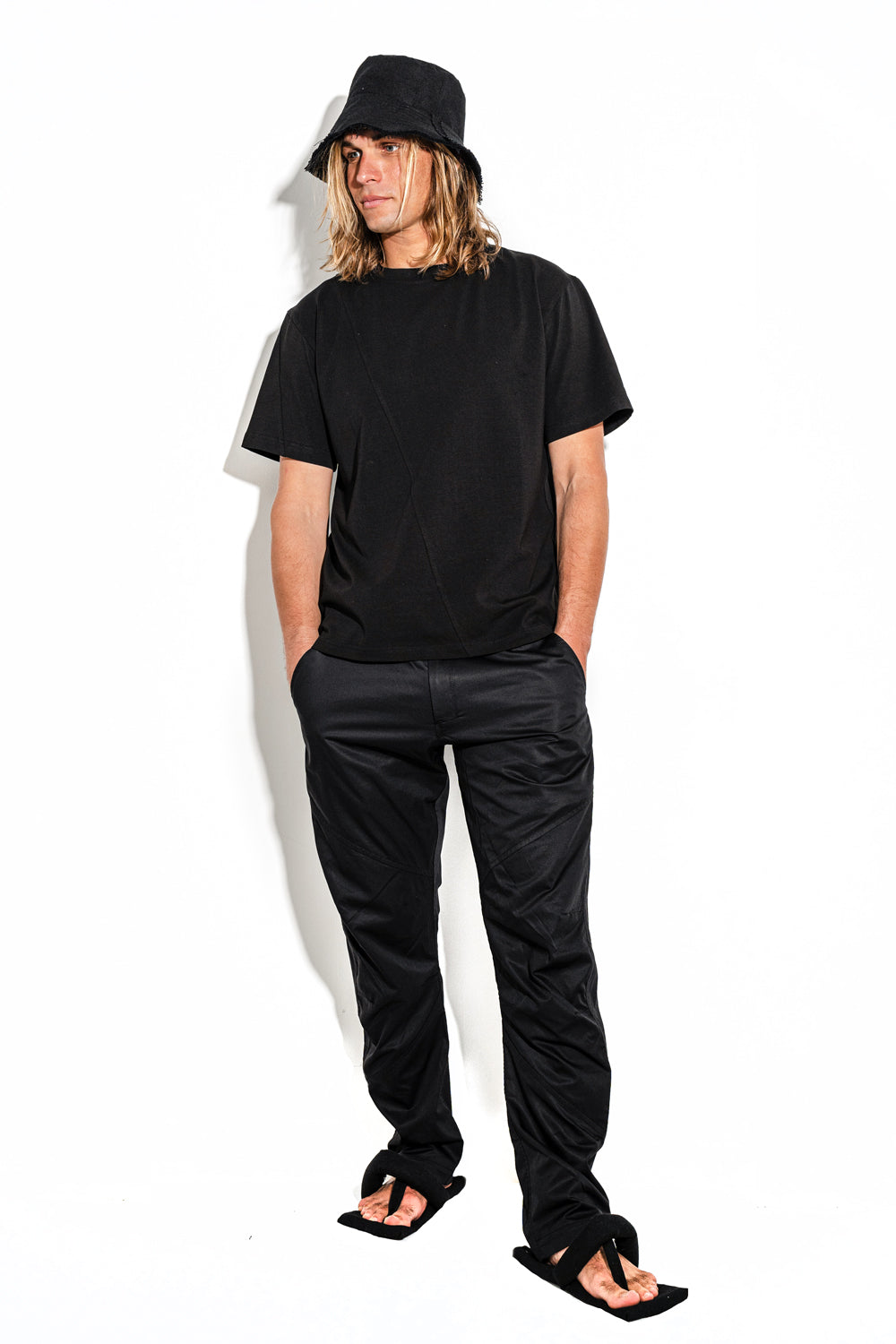 Black T-shirt with a geometric seam