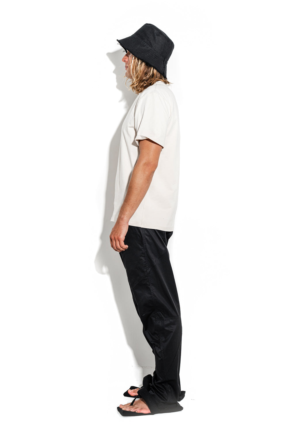 White T-shirt with a geometric seam