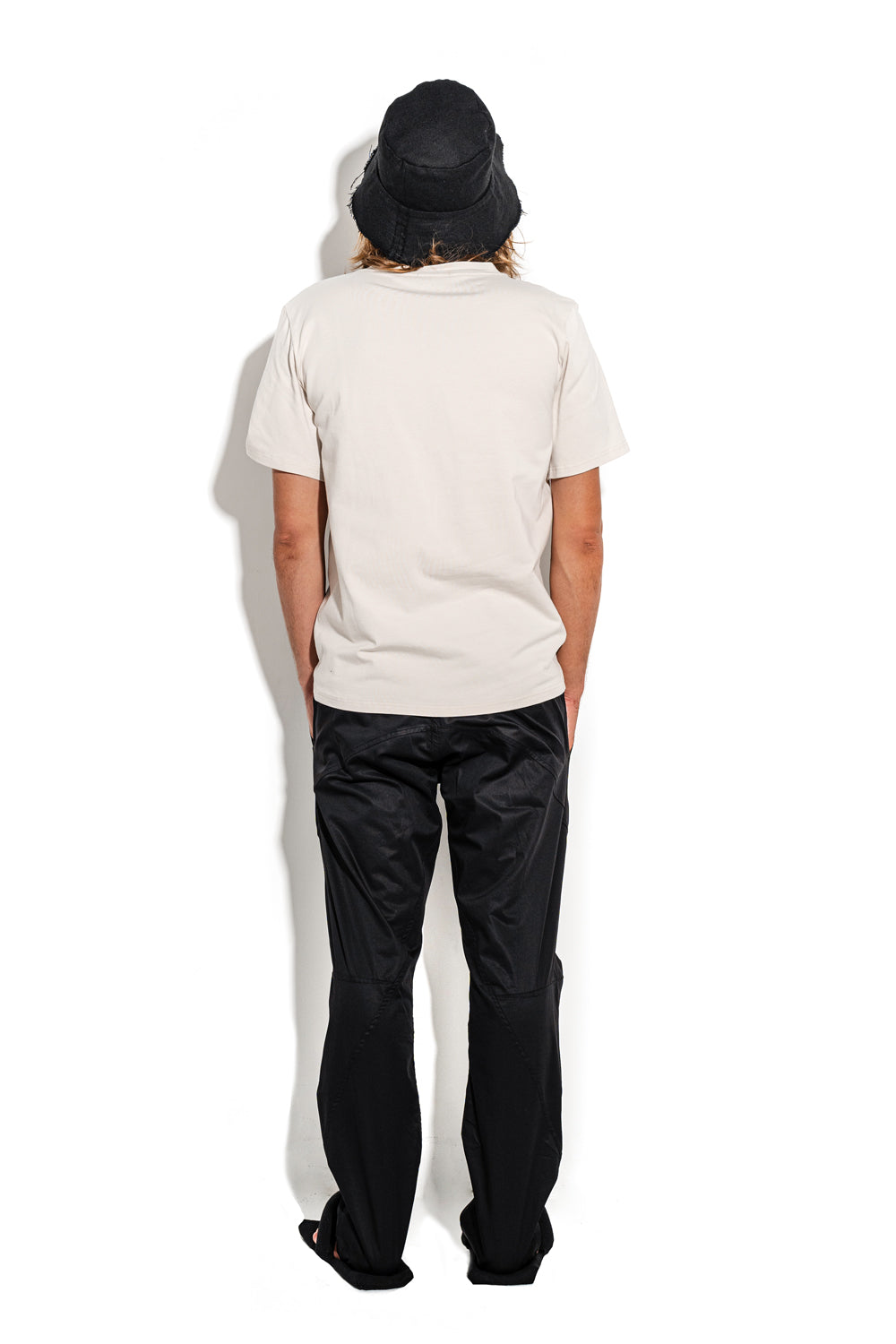 Beige T-shirt with a geometric seam