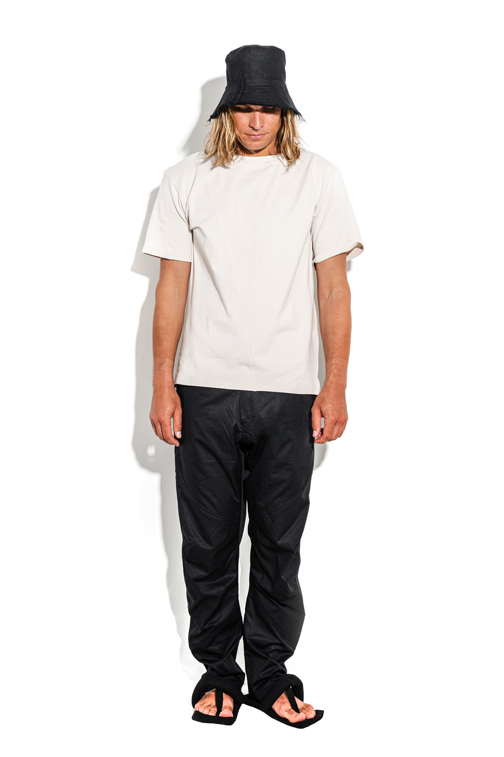 Beige T-shirt with a geometric seam
